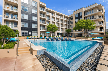 Infinity edge pool with stunning views of downtown dallas